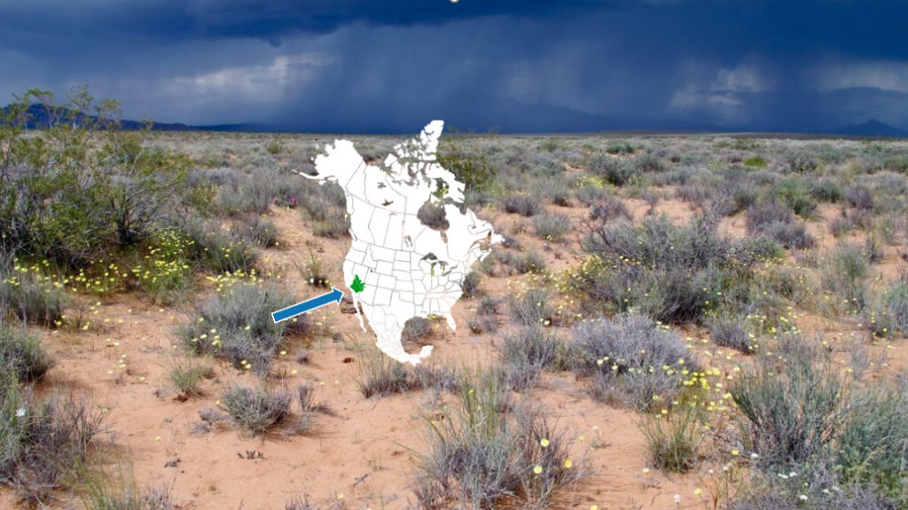 A map of the North American Continent with a background image of the desert on a rainy day.